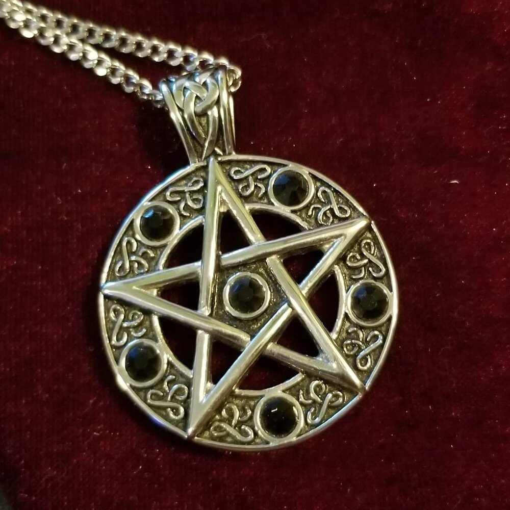 NWOT silver pentagram necklace with Celtic pattern